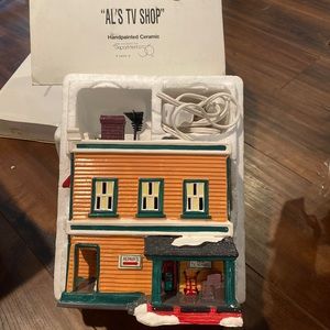 Retired Department 56 “Al’s TV Shop”